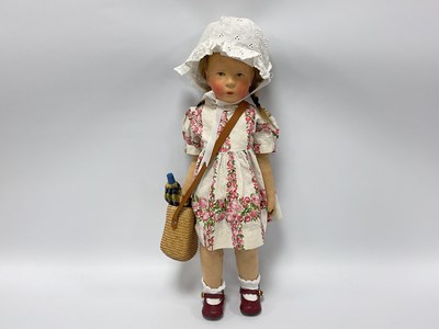 Lot 831 - A Kathe Kruse Doll, with painted hard plastic...