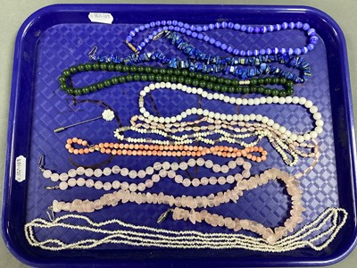 Lot 179 - A Coral Coloured Bead Necklace, of uniform...