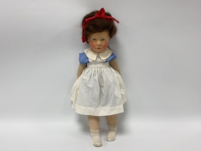 Lot 823 - A Kathe Kruse Doll, with painted hard plastic...