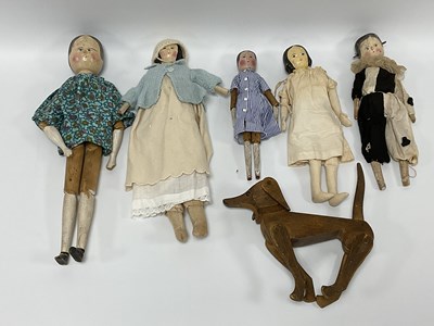 Lot 845 - Five Folk Art Wooden Headed Dolls. (Three with...