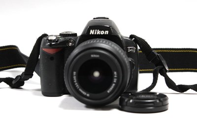 Lot 713 - Nikon D40 DSLR Camera with attached Nikon AF-S...