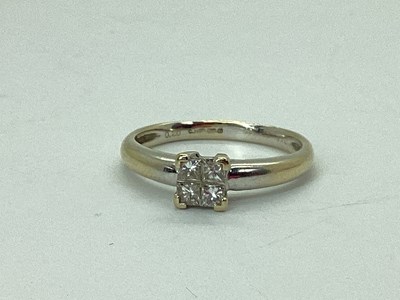 Lot 48 - A Four Stone Diamond Ring, the uniform...