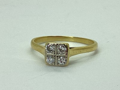 Lot 49 - An 18ct Gold Four Stone Diamond Ring, the...