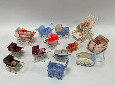 Lot 937 - A Quantity of Mid XX Century Toy Plastic Prams,...