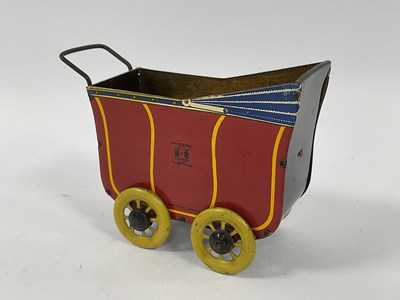 Lot 979 - 1930s Wells Tinplate Toy Pram, red/yellow...