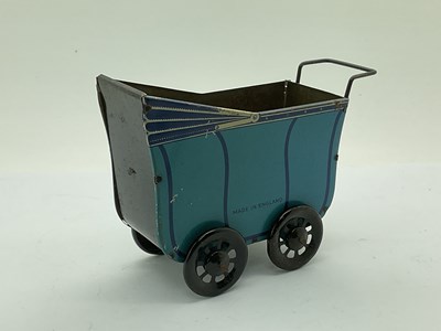 Lot 975 - Mid XX Century Tinplate English Pram, blue,...