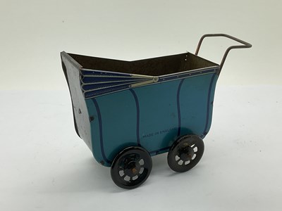 Lot 974 - Mid XX Century Tinplate English Pram, blue...