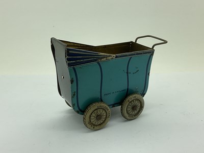 Lot 973 - Mid XX Century Tinplate English Pram, blue...