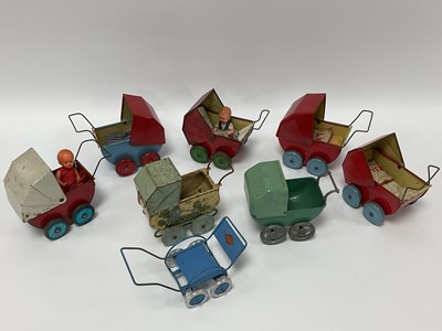 Lot 916 - Seven Mid XX Century Tinplate and a 'Cast' Toy...