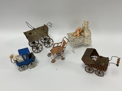 Lot 912 - An Early XX Century Tinplate Toy Doll's Pram,...
