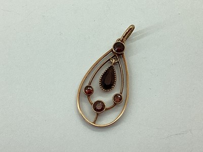 Lot 67 - An Edwardian Style Pendant, of teardrop...