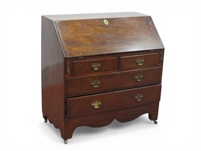 Lot 1558 - An Early XIX Century Oak Bureau, with a fall...