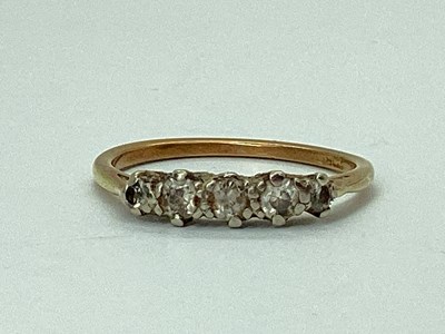 Lot 53 - A Five Stone Ring, claw set throughout,...