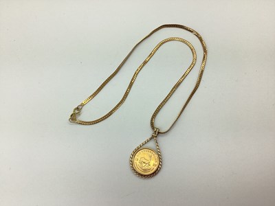 Lot 63 - 1/10 Krugerrand, 1985 (loose?) set within 9ct...
