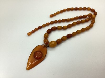 Lot 142 - A Vintage Single Strand Graduated Amber Colour...
