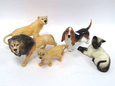 Lot 1214 - Beswick Male Lion, 22cm long, Female lion and...