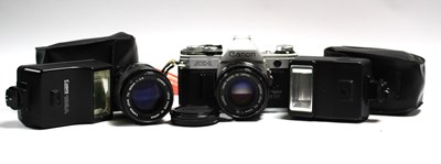 Lot 823 - Canon AE-1 35mm SLR Film Camera No2094233 with...