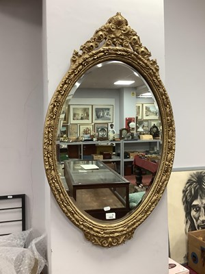Lot 1659 - A Large Baroque-Style Oval Wall Mirror, with...