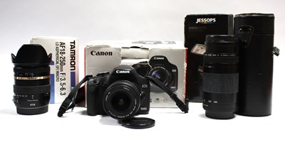 Lot 709 - Canon EOS 500D DSLR Camera with attached EF-S...