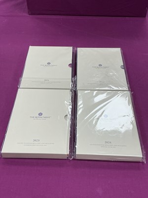 Lot 413 - Four UK Royal Mint Bunc Year Coin Sets,...