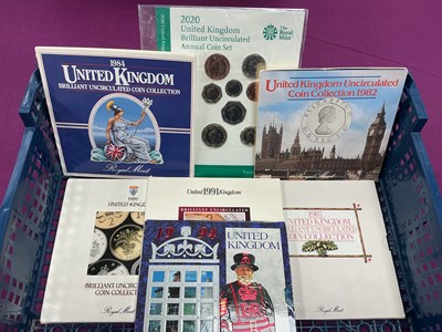 Lot 323 - Seven Royal Mint Bunc Annual Coin Sets,...