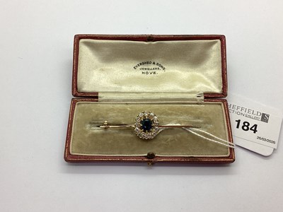 Lot 184 - A Sapphire and Diamond Cluster Bar Brooch,...
