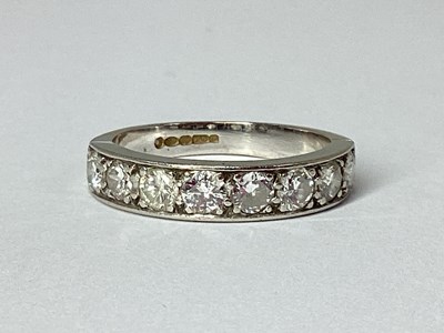 Lot 220 - An 18ct Yellow and White Gold Eight Stone...