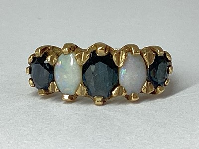 Lot 240 - A 9ct Gold Victorian Style Sapphire and Opal...
