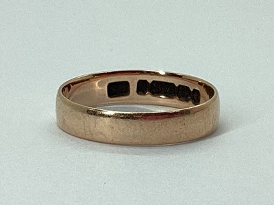 Lot 232 - A 9ct Rose Gold Plain Wedding Band, (finger...