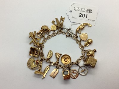 Lot 201 - A Fancy Link Charm Bracelet, suspending...