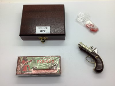 Lot 672 - A B.C.M. Outlaw Pirate Cap Flintlock Pistol,...