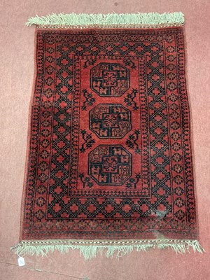 Lot 1576 - Afghanistan Bukhara-style wool rug with...