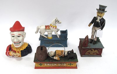 Lot 1441 - Cast metal painted money boxes to include...