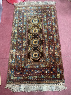 Lot 1620 - Middle Eastern Wool Pile Tassled rug, with...