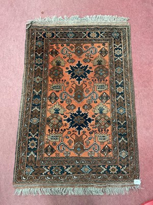 Lot 1575 - Middle Eastern Wool Tassled Rug, with two...