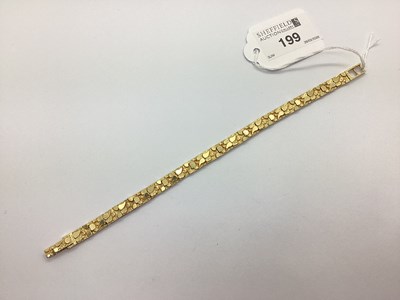 Lot 199 - A Nugget Link Panel Style Bracelet, of uniform...