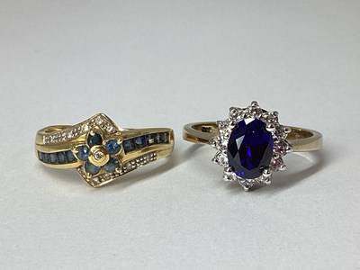 Lot 229 - A Modern Stone Set Dress Ring, flower head...