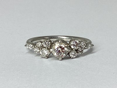 Lot 213 - A Modern Platinum and Diamond Ring, the...
