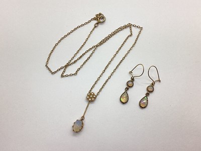 Lot 170 - A Dainty Edwardian Opal and Seed Pearl Drop...
