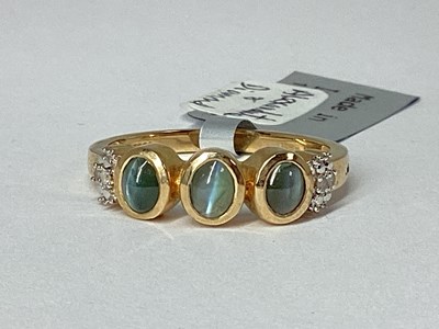 Lot 245 - The Genuine Gemstone Company; A 9ct Gold Cats...