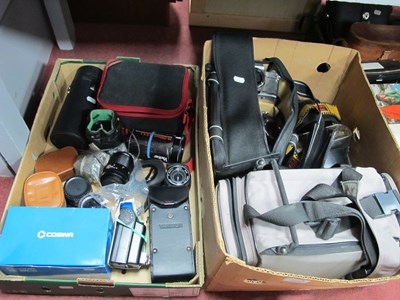 Lot 1085 - SLR cameras and lenses, including bagged...