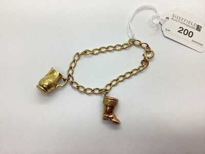 Lot 200 - A 9ct Gold Curb Link Bracelet, suspending two...