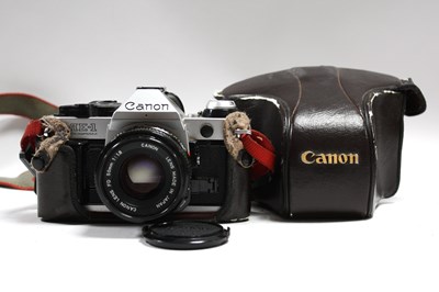 Lot 828 - Canon AE-1 Program 35mm SLR Film Camera,...