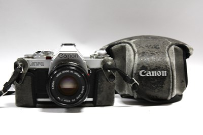 Lot 832 - Canon AV-1 35mm SLR Film Camera No.1553848...