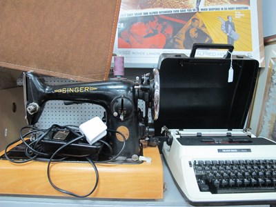 Lot 1145 - A Cased 1946 Singer 201K Electric Sewing...