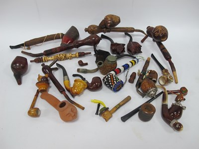 Lot 1375 - Quantity of vintage smoking pipes, featuring...
