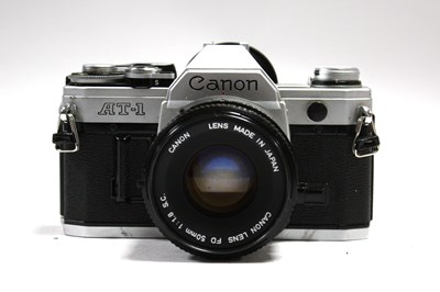 Lot 830 - Canon AT-1 35mm SLR Film Camera, silver,...