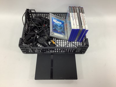 Lot 629 - A Sony PlayStation 2 (PS2) games console, two...