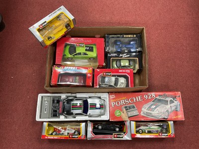 Lot 443 - Nine Diecast model vehicles by Burago, Revell,...