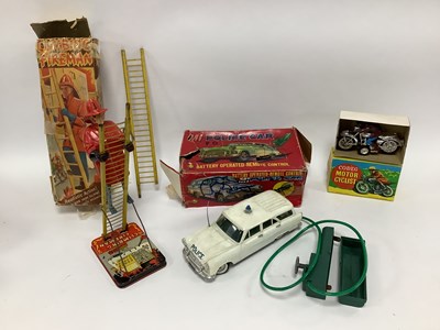 Lot 589 - A Marx No. 735 Clockwork Climbing Fireman toy...